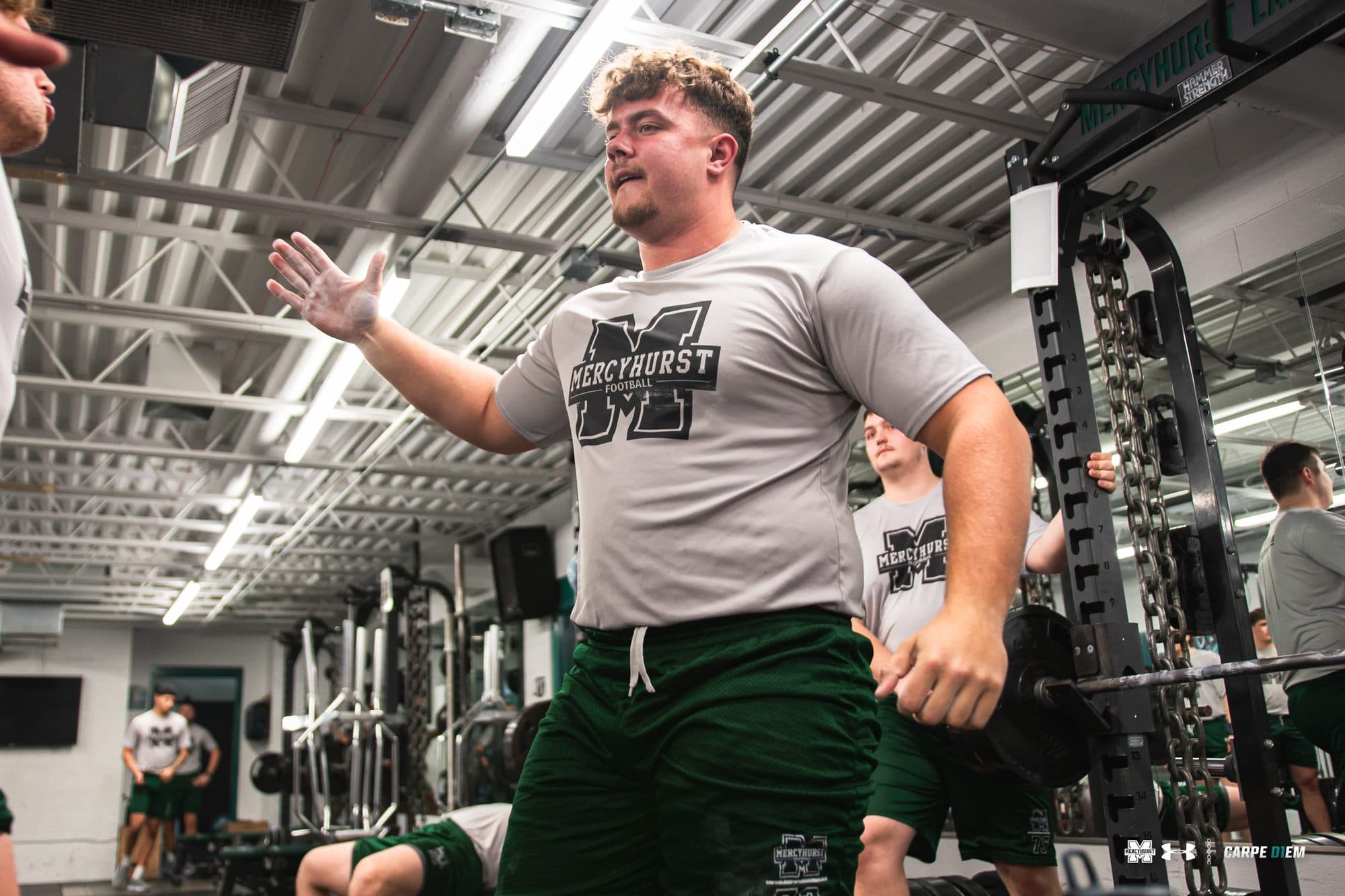 SPOTTR athlete training in the weight room